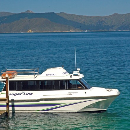 Travellers get ready to board a Cougar Line vessel in the Marlborough Sounds