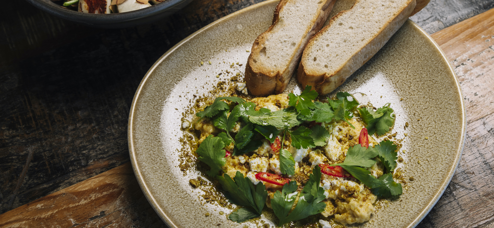 A plate of fresh seasonal food served at Furneux Lodge in the Marlborough Sounds, New Zealand.